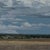 Textile Gathering Form by Michael Magrin | Oil on Canvas Landscape With Towering Cumulus Clouds For Sale - Image 7 of 14