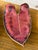 A striking pair of handcrafted studio pottery leaf form trays signed and dated 2017. Finished in a rich oxblood glaze with...