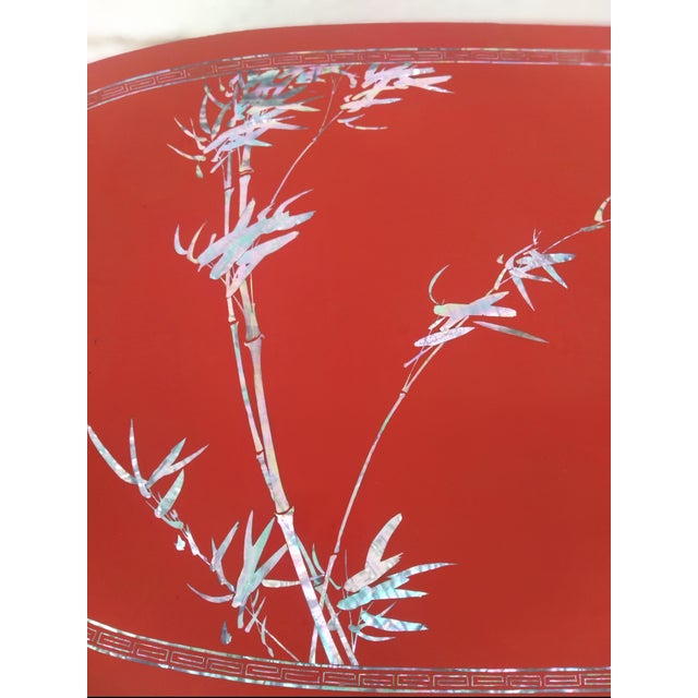 Early 21st Century Chinese Folding Leg Red Lacquer Coffee Table With Mother of Pearl Inlay For Sale - Image 5 of 7