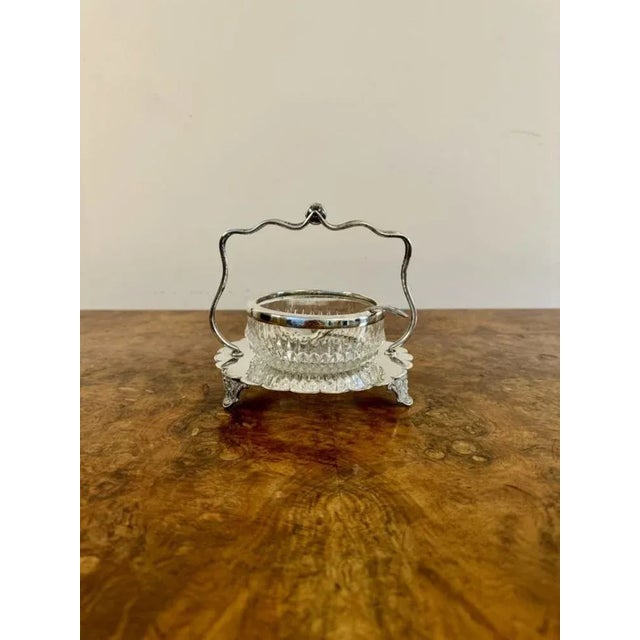 Elegant antique Edwardian silver plated jam pot and spoon, having an elegant cut glass jam pot with a silver plated rim...