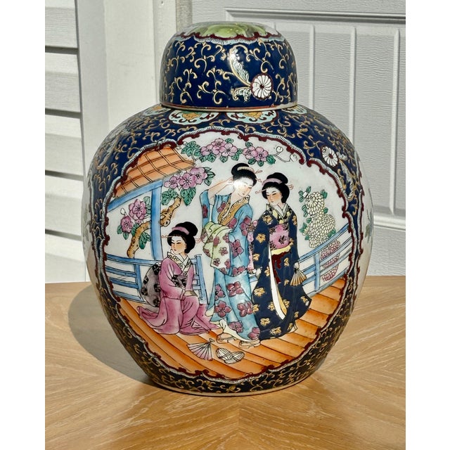 Vintage (1980's) Lidded Ginger Jar has a Chinese Style. Wood Base. The Measurements: 9"Diam. x 14"H / Without Lid 11"H....