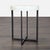 Simple and sculptural, the Bone Side Table is an accent piece that combines an industrial-looking iron crossed base with...