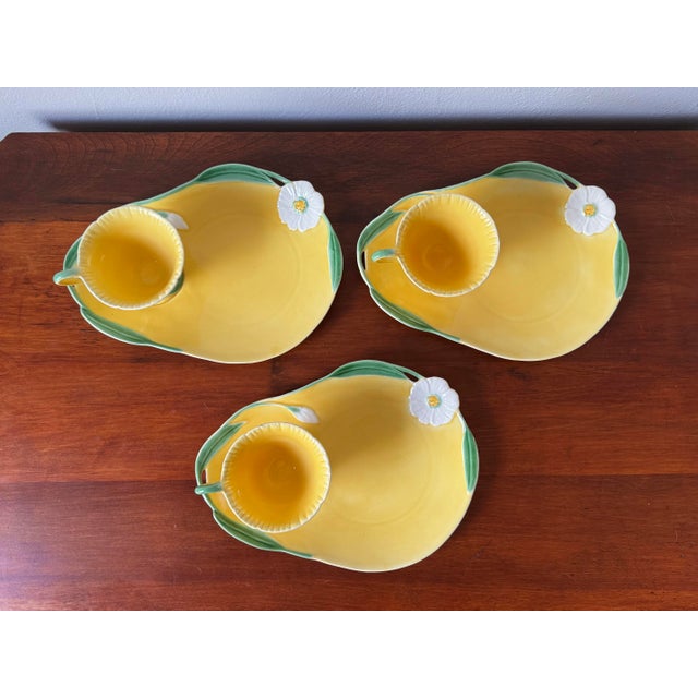 Bright and cheerful vintage California pottery snack set by Vallona Starr, featuring three matching cup-and-plate luncheon...
