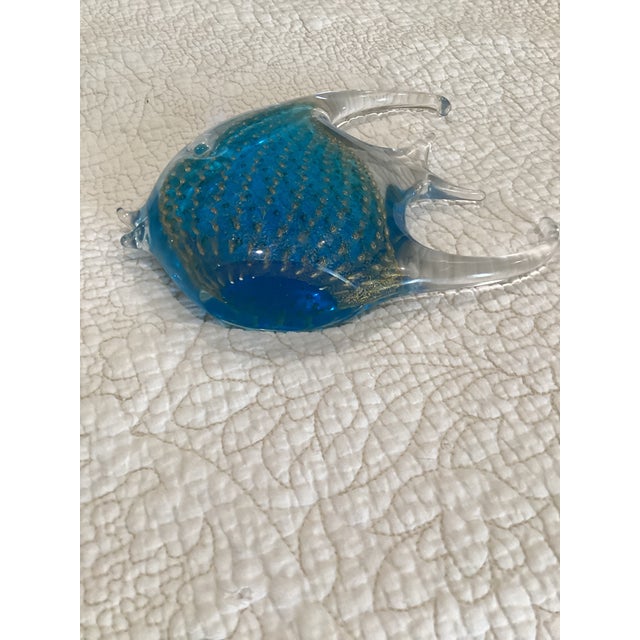 Murano glass angelfish, blue with controlled avventurina copper flakes in strings running vertically through it. This...