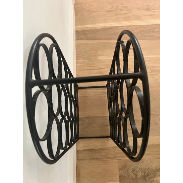 Vintage Arthur Umanoff 17-bottle wine rack for Shaver Howard, circa 1960s. Constructed of substantial wrought iron with...