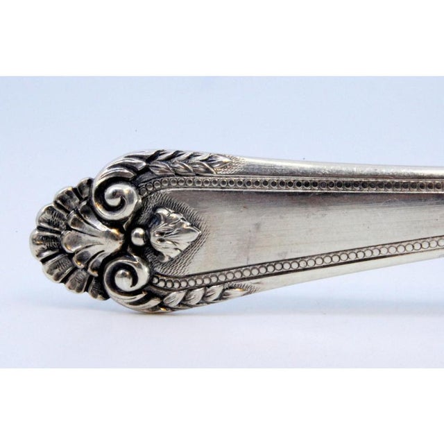 Metal Silver Vegetable Spoon with Reliefs on the Shell and Grooves For Sale - Image 7 of 8