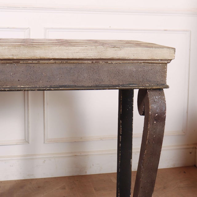 Interesting pair of 19th C painted Spanish pine/oak console tables.1890 This piece is designed in the style of the...