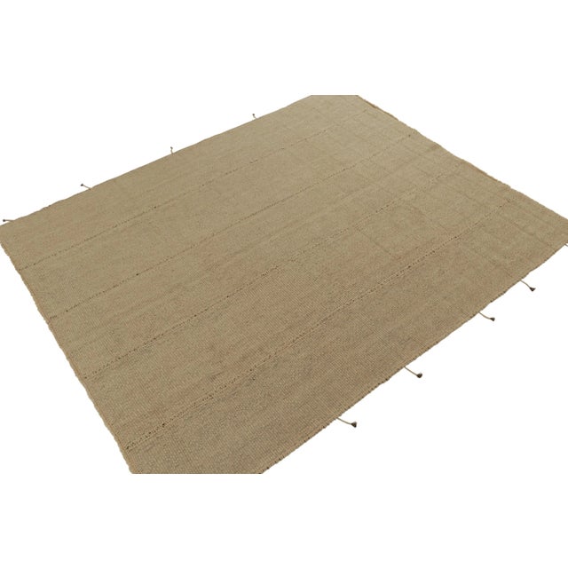 Handwoven in wool, an 8x10 Kilim from an innovative new contemporary flat weave collection by Rug & Kilim. On the Design:...