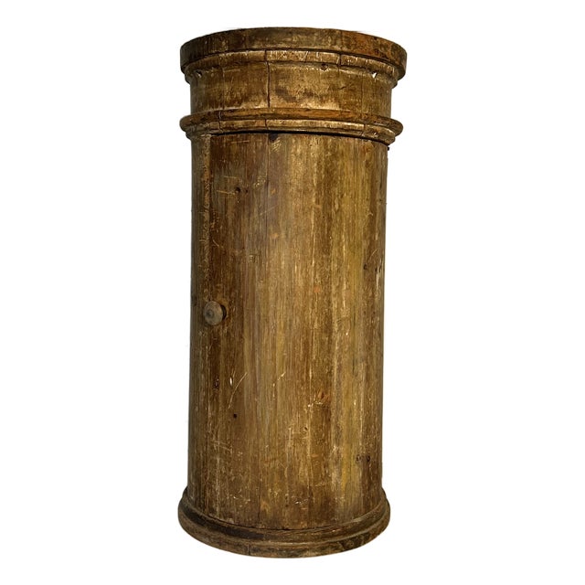 19th century American rustic cylindrical pedestal with interior storage cabinet inside hinged door. Lovely blue painted...