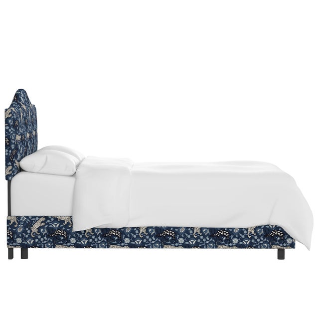 This fully upholstered bed has a unique headboard shape, allowing you to chart a course for a bedroom retreat that is at...