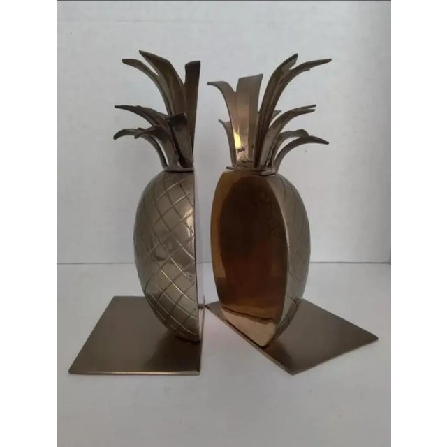 For your consideration. . . This is a fabulous pair of brass bookends. They are made of solid brass with red felt...