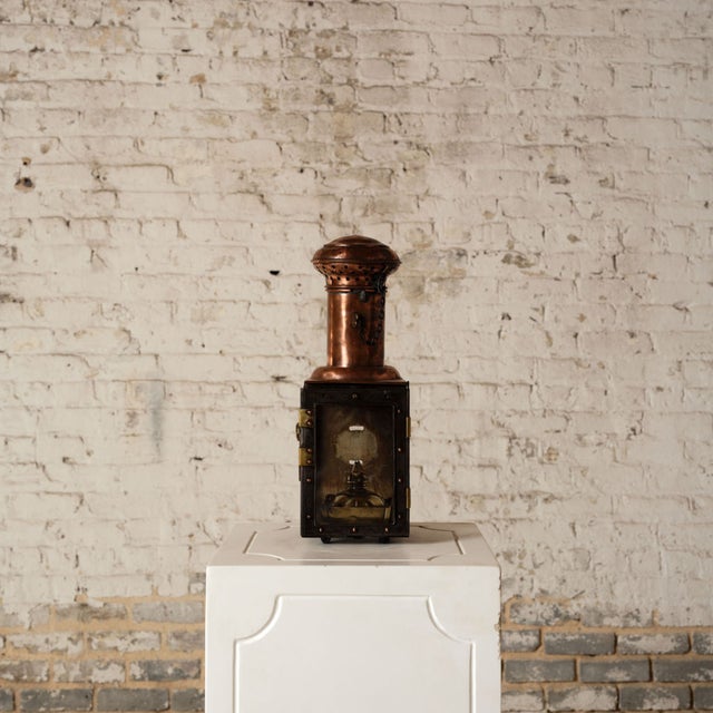 Add bold, Old World character to your space with this 19th century French brass and black lantern, a striking piece that...