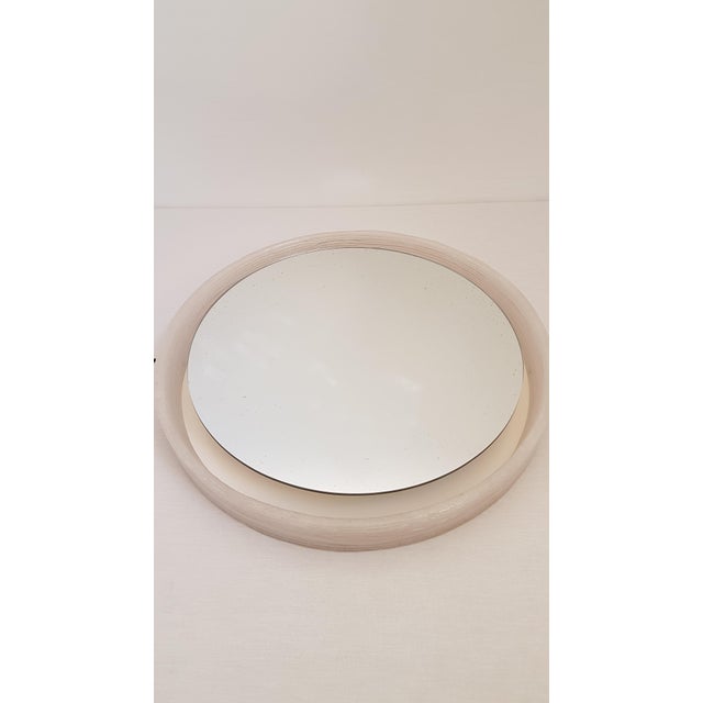 Round Hillebrand mirror - 1970s Round mirror with an acrylic edge that looks like ice glass. The mirror has 5 light points...