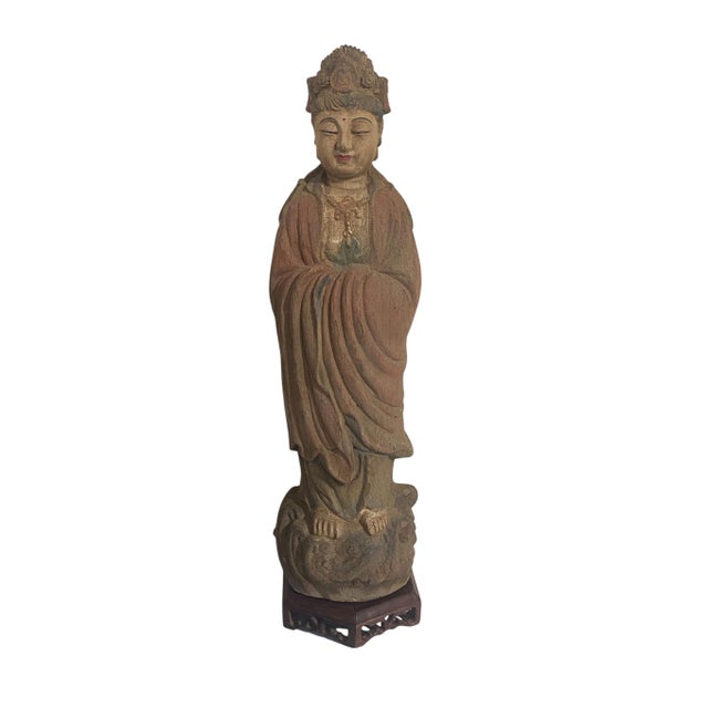 This magnificent Crowned Lord Buddha statue is expertly hand carved from a single piece of wood, featuring delicate...