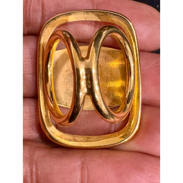 Salvatore Ferragamo Gold Tone authentic scarf ring with designer engraved signature at back Scarf Ring Length 1.5 " Width...