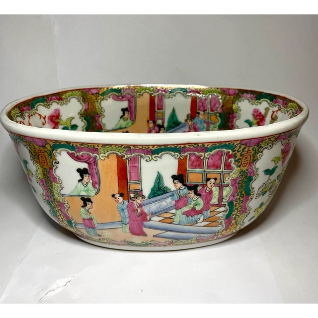 Vintage Chinese porcelain oval cachepot, dating to approximately the mid-20th century and decorated in the famille rose...
