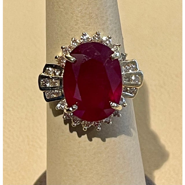 Oval 12 Carat Treated Ruby and 1 Carat Diamond 14 Karat Yellow Gold Ring For Sale - Image 14 of 18