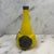 Striking French yellow Art Nouveau glass vase featuring a sculptural long-necked form accented with dark pressed silver...