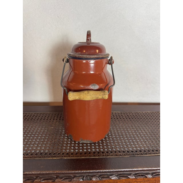 Vintage 2-liter metal canteen milk jug marked “Bonyhád,” dating to the 1940s. Featuring a classic utilitarian form with a...