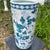 This Vintage Blue and White Chinoiserie Porcelain Hand-Painted Floral Umbrella Stand showcasing intricate Chinese culture...