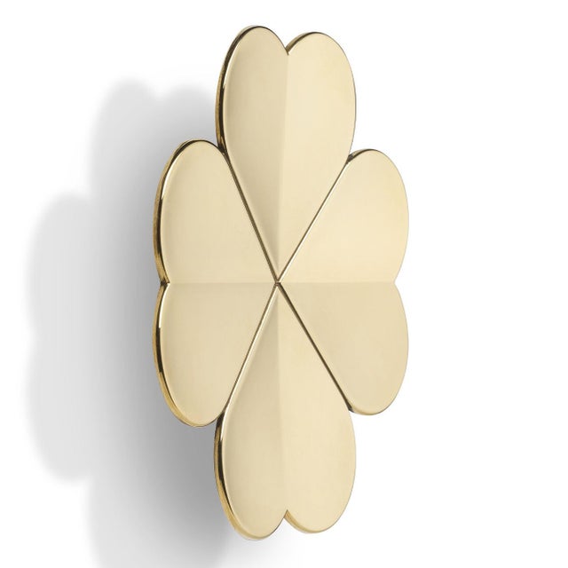 The Lucky coat stand by Richard Hutten features a refined silhouette inspired by a four-leaf clover, symbolizing...