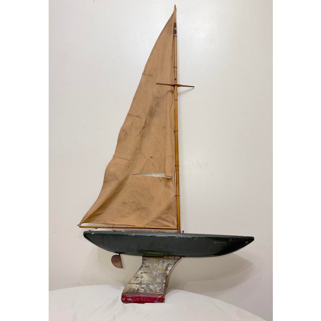 Up for sale is a rare antique handmade 19th century Folk Art wood and metal sailing yacht. It is a unique and historically...