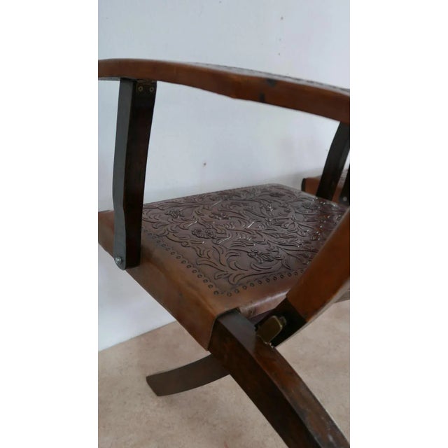 Set of three in a very good, original condition: Two high back folding chairs and one coffee table - 84 cm diameter, 40cm...