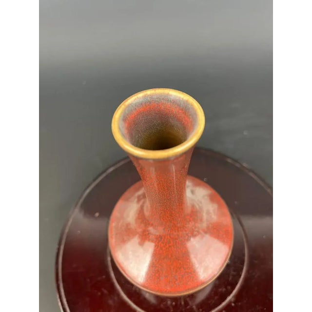 H-15.5cm,W-10cm. This Chinese Vintage Porcelain Vase from the Ming Dynasty boasts a Tianshun Marked Flambé Glaze that is...