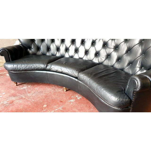 Gorgeous Italian Chesterfield style sofa dating back to the 1940s and handmade with a real leather -leather cover with a...