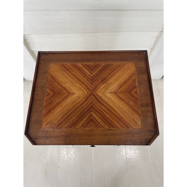 A 20th century Louis XV style side table, known as a chevet, having a single drawer over an open cubby hole. The nicely...