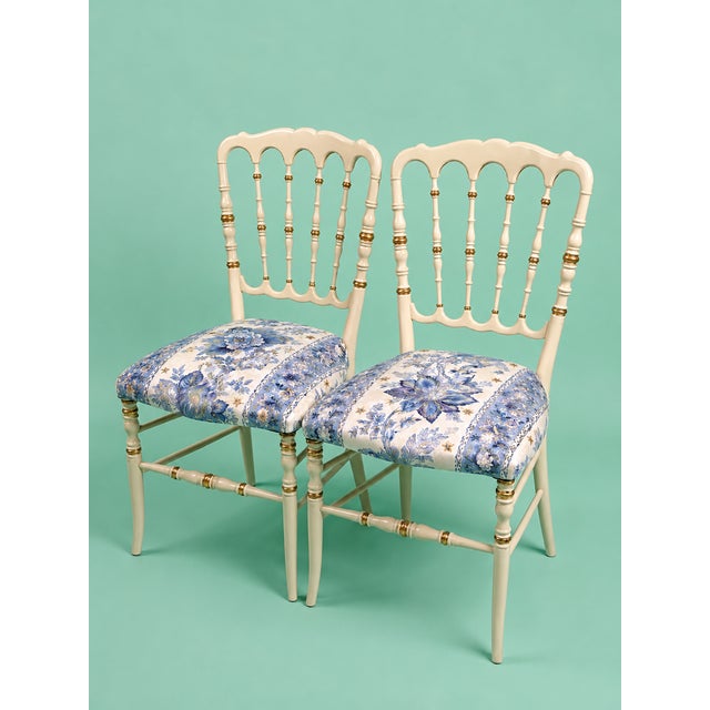 Napoleon III Style Chair in Ivory Lacquer with Gilt Details and Blue Floral Upholstery, 1970s, in Very Good conditions....