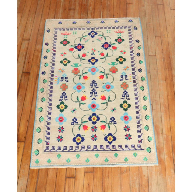 A mid-20th-century wool Turkish Anatolian small size colorful rug
