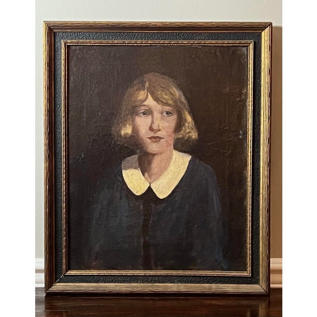 Late 19th century unsigned oil portrait of a young girl, titled "Little Orphant Annie" in a gold painted and black wood...