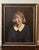 Late 19th century unsigned oil portrait of a young girl, titled "Little Orphant Annie" in a gold painted and black wood...