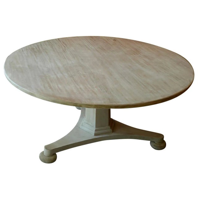 Custom 72" round table in finish as shown.