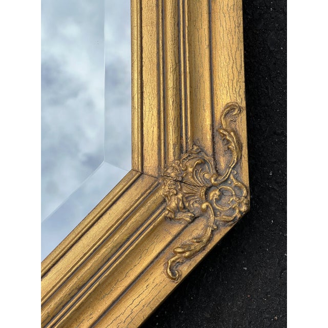 Introducing a Vintage Octagonal Gilt Beveled Glass Decorator Mirror, measuring 29 inches in height by 41 inches in width,...
