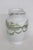 This charming Small Vase is made out of Earthenware pottery. This compact decorative vessel is marked on the bottom as...
