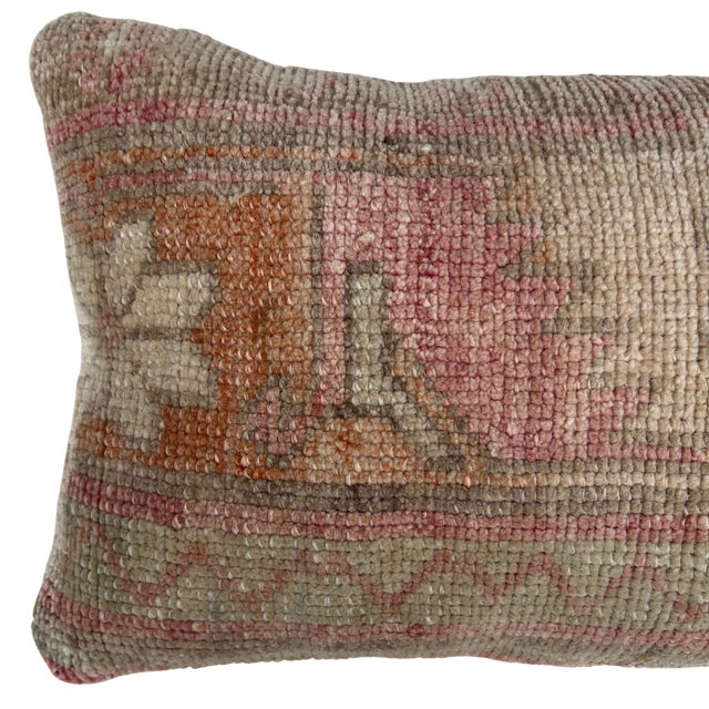 Crafted from an authentic vintage Turkish rug, this one-of-a-kind pillow is rich with history, texture, and timeless...