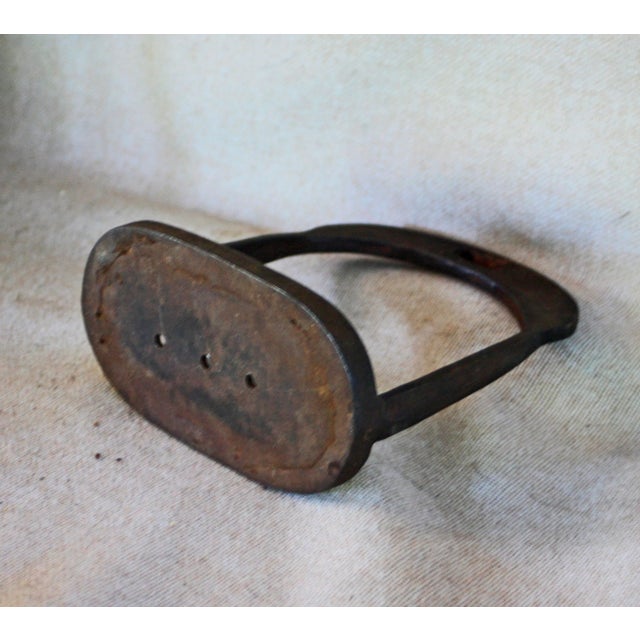 Very nice antique pair of Chinese horse riding stirrups, well aged and patinated...dating to the Qing Dynasty. The lack of...