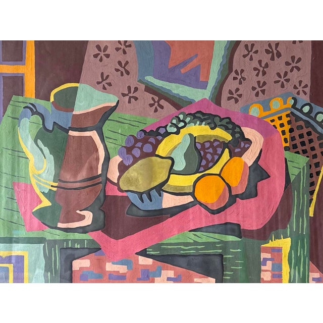 A vibrant 1950s Cubist Modernist still life painting featuring a bold geometric composition of fruit, pottery, and...