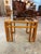 This mid-century modern coffee table blends a heavy, architectural presence with clean geometric lines. The base is...