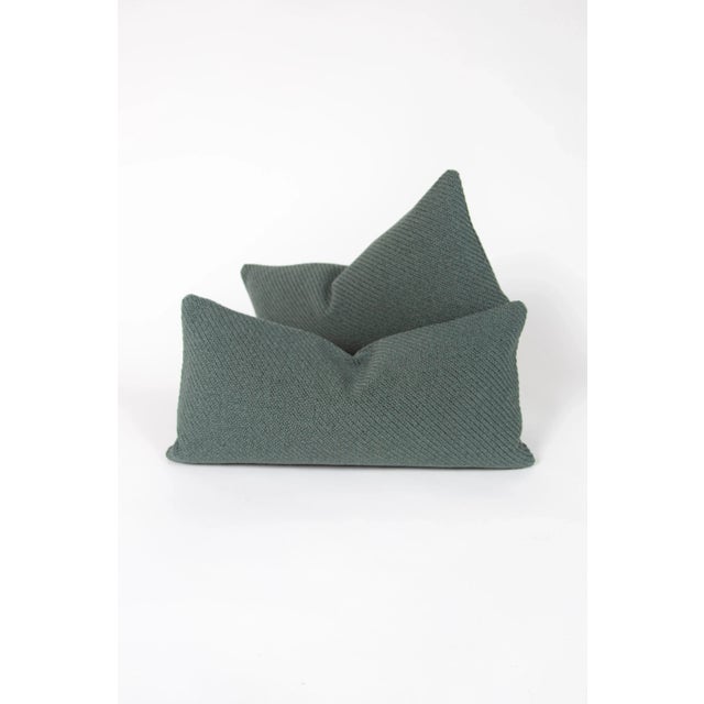 This pillow is where elegance and comfort meet. With a muted teal knit fabric, and a down feather insert–this pillow will...