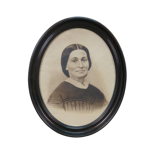 Pair of mid to late 19th century black and white photographic portraits, enhanced with hand drawn detail. Each displays a...