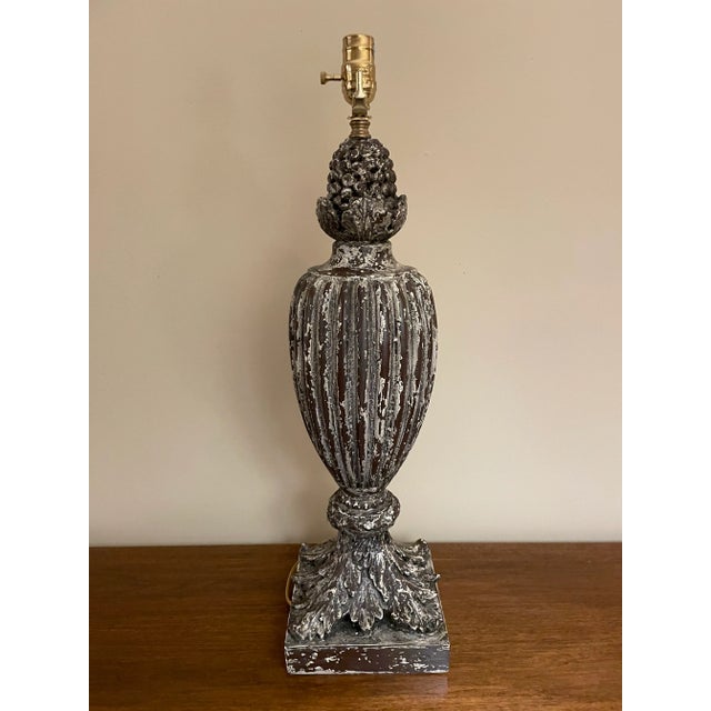 This unique lamp from the John-Richard Collection will add dimension and interest to your space through its timeless...