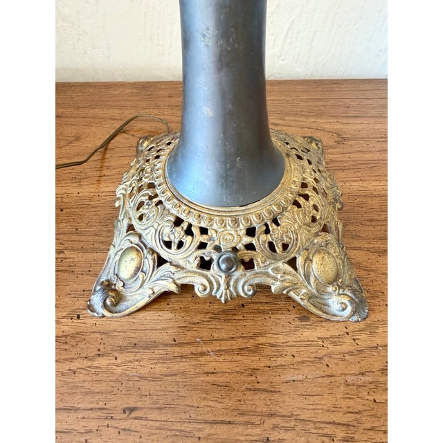 Beautiful antique lamp by Bradley & Hubbard. Unusual handpainted stagecoach and cactus design on the globe.