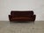 Three-seater velvet sofa from the 1950s. Made in Italy. Refined three-seater sofa with sinuous curved armrests....
