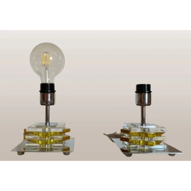 We present our impressive vintage bedside table lamps made of high-quality chrome-plated brass and superimposed cubes of...