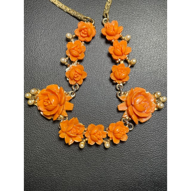 Mid-Century Modern Mid Century Modern Carved Floral Faux Coral and Pearls on Textured Brass Chevron Chain and Orange Push Clasp For Sale - Image 3 of 7