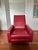 Authentic Design Within Reach Flight Recliner in vibrant red leather with stainless steel sled base. Designed by Jeffrey...