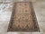 This mid-20th century Persian Malayer rug, measuring 3' 5" x 6' 0", presents a graceful allover design woven in a refined,...
